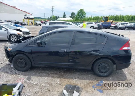 2012 Honda Insight from USA, damaged, VIN JHMZE2H36CS000448